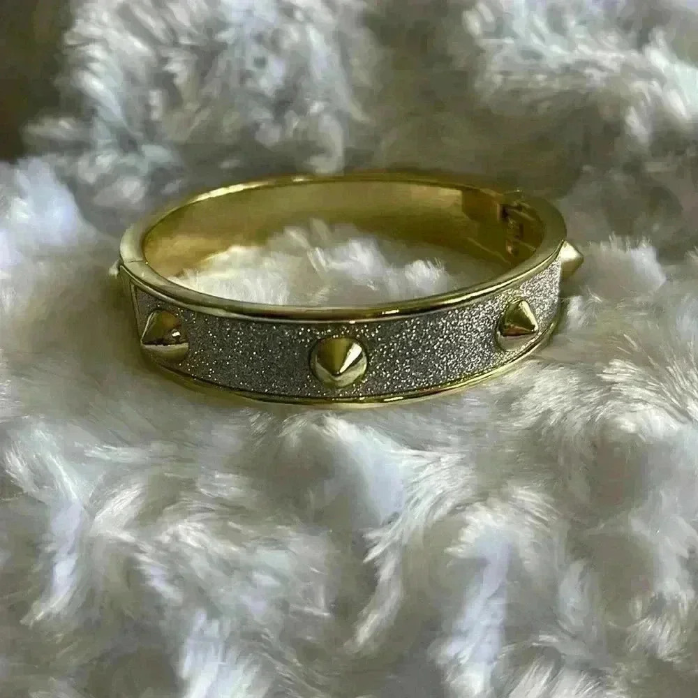 Glittery and golden bangle